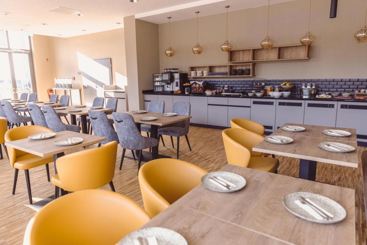 Hotel Libertas Elements Pure Merzhausen Buitenkant foto
